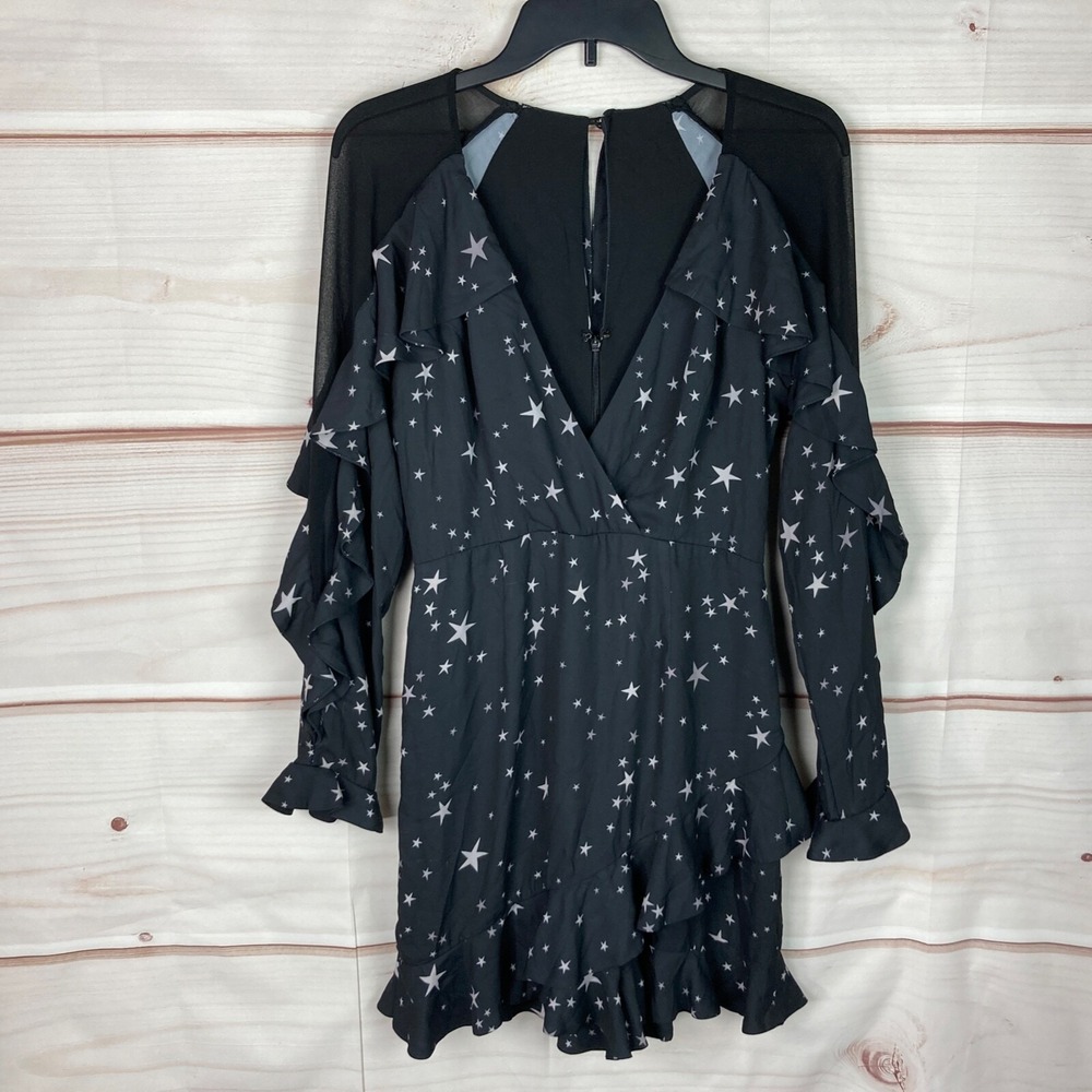 Fame And Partners Romper Womens 4 Black Star Print Skort Ruffle Sleeve V-Neck